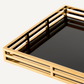 Plateau doré en verre noir
